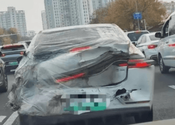 Shock as ride-hailing car with taped-up damaged boot go viral